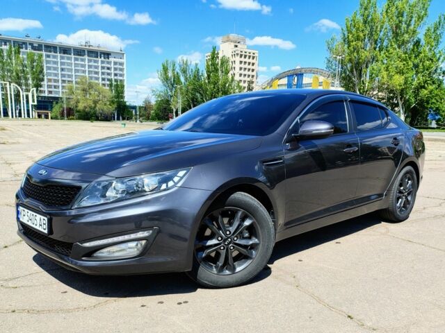 Сірий Кіа Оптіма, об'ємом двигуна 2 л та пробігом 200 тис. км за 10999 $, фото 1 на Automoto.ua