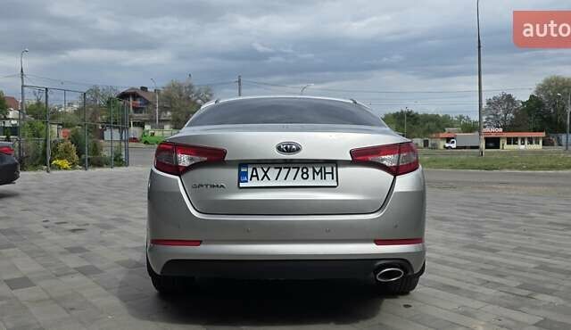 Серый Киа Оптима, объемом двигателя 2 л и пробегом 308 тыс. км за 11300 $, фото 3 на Automoto.ua