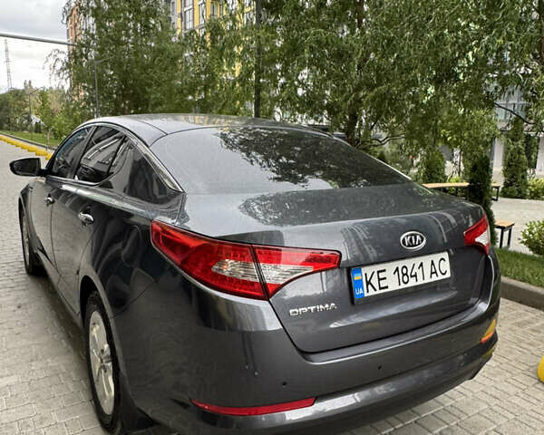 Серый Киа Оптима, объемом двигателя 2 л и пробегом 153 тыс. км за 10500 $, фото 3 на Automoto.ua