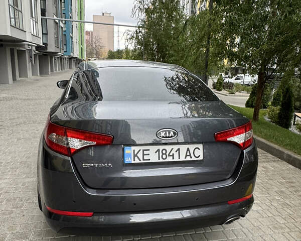 Серый Киа Оптима, объемом двигателя 2 л и пробегом 153 тыс. км за 10500 $, фото 2 на Automoto.ua