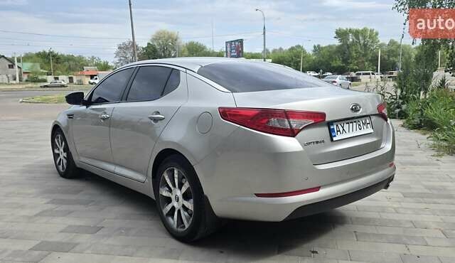 Серый Киа Оптима, объемом двигателя 2 л и пробегом 308 тыс. км за 11300 $, фото 4 на Automoto.ua