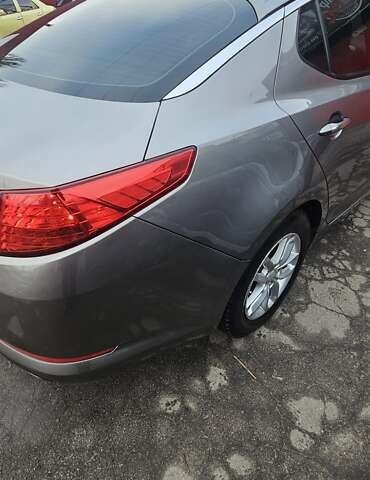 Серый Киа Оптима, объемом двигателя 2.36 л и пробегом 191 тыс. км за 7900 $, фото 6 на Automoto.ua