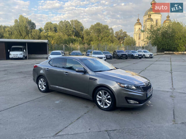 Серый Киа Оптима, объемом двигателя 2.36 л и пробегом 170 тыс. км за 10500 $, фото 1 на Automoto.ua