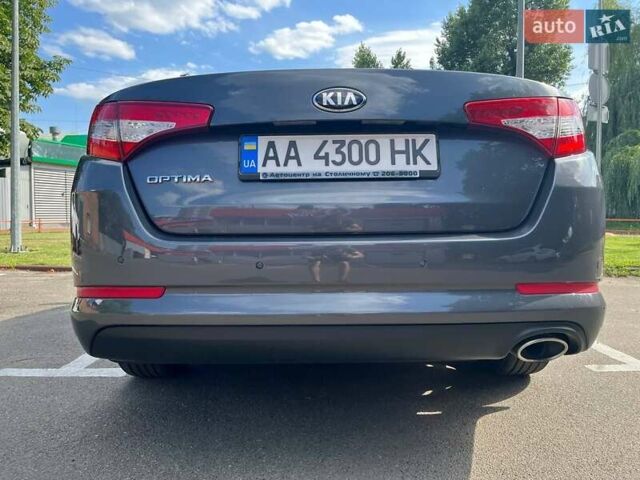 Серый Киа Оптима, объемом двигателя 2 л и пробегом 269 тыс. км за 9300 $, фото 11 на Automoto.ua