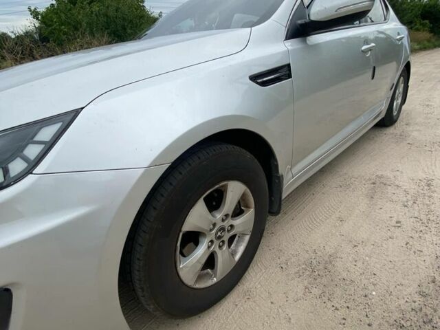 Серый Киа Оптима, объемом двигателя 2 л и пробегом 290 тыс. км за 6500 $, фото 4 на Automoto.ua