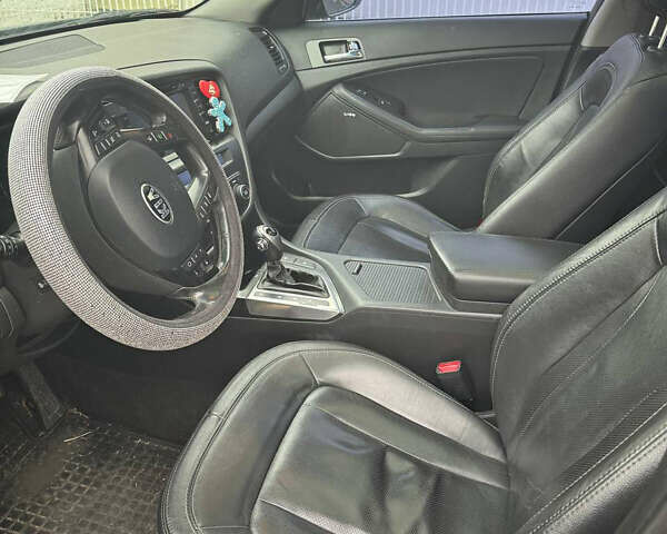 Серый Киа Оптима, объемом двигателя 2.36 л и пробегом 260 тыс. км за 9500 $, фото 5 на Automoto.ua