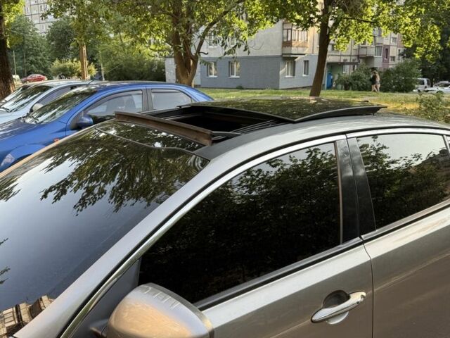 Сірий Кіа Оптіма, об'ємом двигуна 2 л та пробігом 193 тис. км за 9700 $, фото 4 на Automoto.ua