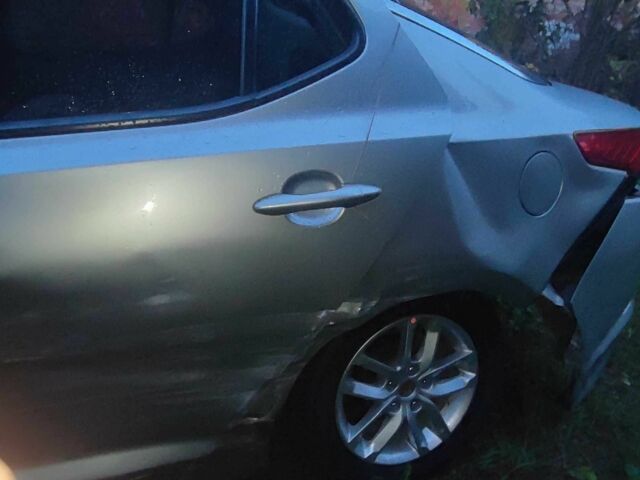 Серый Киа Оптима, объемом двигателя 2 л и пробегом 347 тыс. км за 3500 $, фото 8 на Automoto.ua