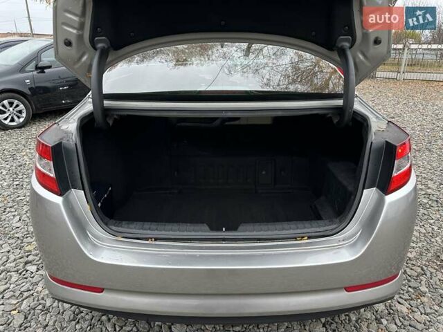 Серый Киа Оптима, объемом двигателя 2.4 л и пробегом 220 тыс. км за 8900 $, фото 11 на Automoto.ua