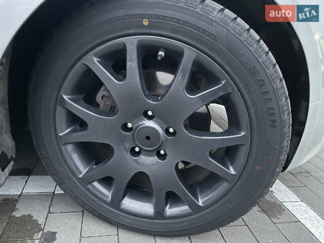 Серый Киа Оптима, объемом двигателя 2.36 л и пробегом 260 тыс. км за 7500 $, фото 22 на Automoto.ua