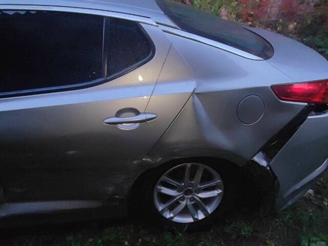 Серый Киа Оптима, объемом двигателя 2 л и пробегом 347 тыс. км за 3500 $, фото 4 на Automoto.ua