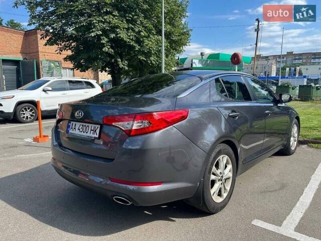 Серый Киа Оптима, объемом двигателя 2 л и пробегом 269 тыс. км за 9300 $, фото 2 на Automoto.ua