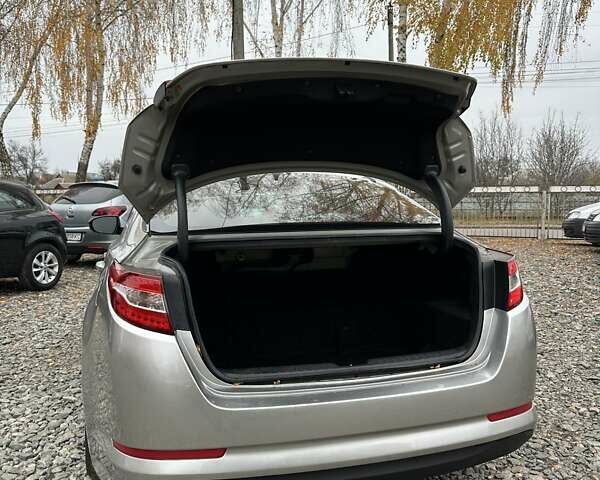 Серый Киа Оптима, объемом двигателя 2.4 л и пробегом 220 тыс. км за 8900 $, фото 6 на Automoto.ua