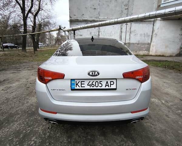 Серый Киа Оптима, объемом двигателя 2.36 л и пробегом 195 тыс. км за 8900 $, фото 5 на Automoto.ua