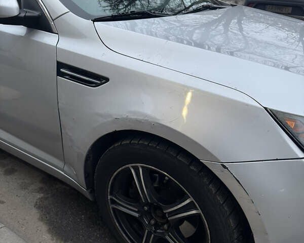 Сірий Кіа Оптіма, об'ємом двигуна 2.36 л та пробігом 256 тис. км за 7800 $, фото 4 на Automoto.ua