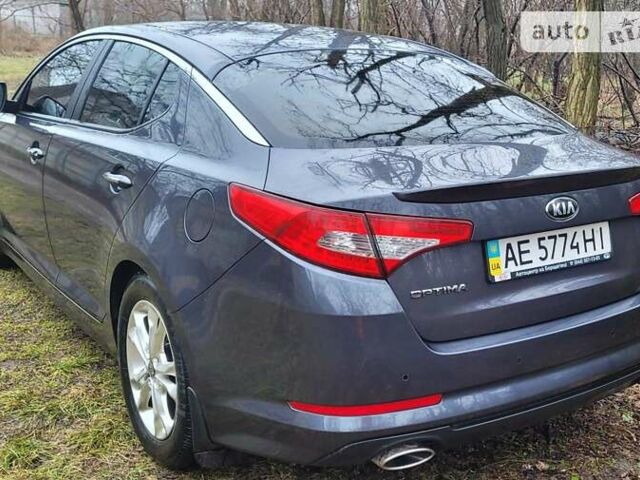 Сірий Кіа Оптіма, об'ємом двигуна 2.36 л та пробігом 175 тис. км за 10650 $, фото 7 на Automoto.ua