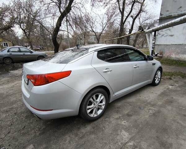 Серый Киа Оптима, объемом двигателя 2.36 л и пробегом 195 тыс. км за 8900 $, фото 6 на Automoto.ua