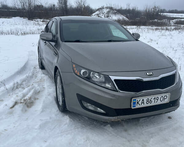 Сірий Кіа Оптіма, об'ємом двигуна 2.36 л та пробігом 215 тис. км за 8999 $, фото 5 на Automoto.ua