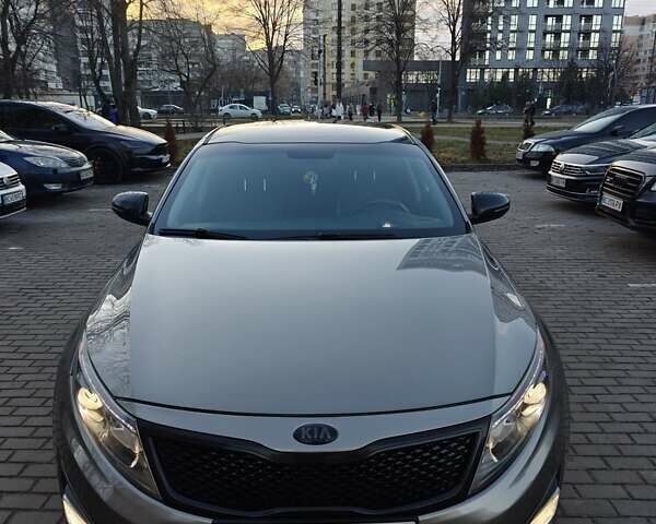 Серый Киа Оптима, объемом двигателя 2 л и пробегом 246 тыс. км за 13000 $, фото 1 на Automoto.ua