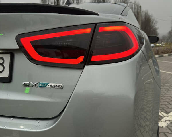 Сірий Кіа Оптіма, об'ємом двигуна 2.36 л та пробігом 174 тис. км за 12900 $, фото 7 на Automoto.ua