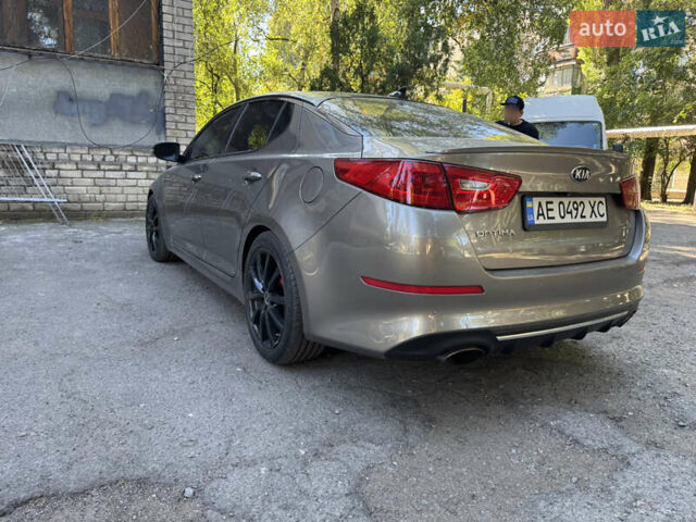 Серый Киа Оптима, объемом двигателя 2 л и пробегом 153 тыс. км за 12800 $, фото 4 на Automoto.ua