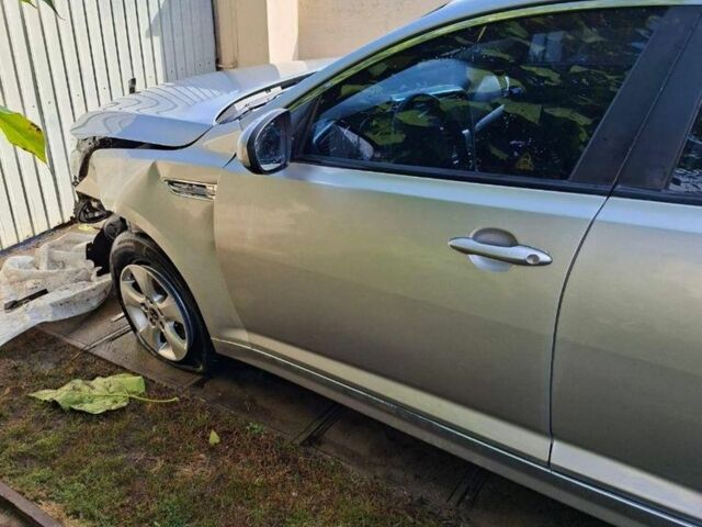 Серый Киа Оптима, объемом двигателя 2 л и пробегом 160 тыс. км за 3800 $, фото 1 на Automoto.ua