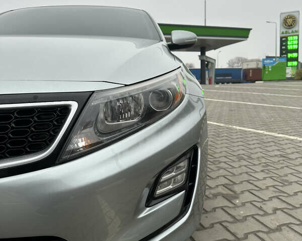 Сірий Кіа Оптіма, об'ємом двигуна 2.36 л та пробігом 174 тис. км за 12900 $, фото 4 на Automoto.ua