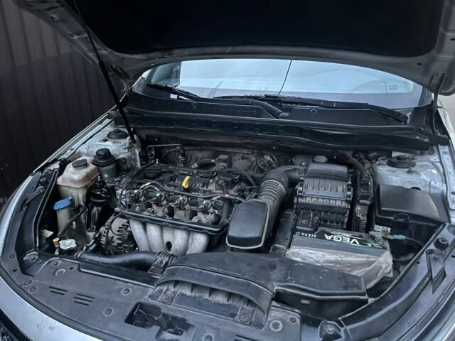 Серый Киа Оптима, объемом двигателя 2 л и пробегом 230 тыс. км за 8699 $, фото 6 на Automoto.ua