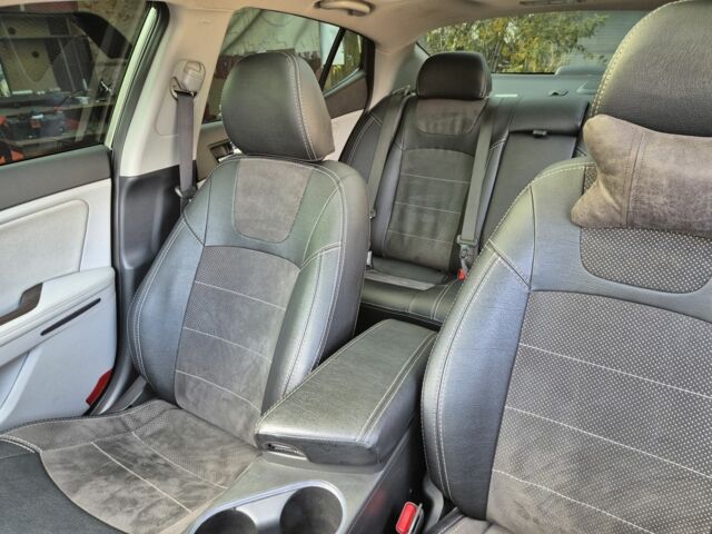 Серый Киа Оптима, объемом двигателя 2.4 л и пробегом 202 тыс. км за 9700 $, фото 4 на Automoto.ua