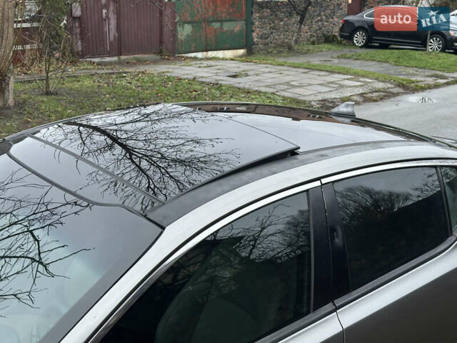 Сірий Кіа Оптіма, об'ємом двигуна 2.36 л та пробігом 220 тис. км за 8500 $, фото 11 на Automoto.ua