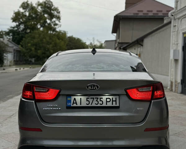 Сірий Кіа Оптіма, об'ємом двигуна 2.36 л та пробігом 348 тис. км за 7300 $, фото 4 на Automoto.ua