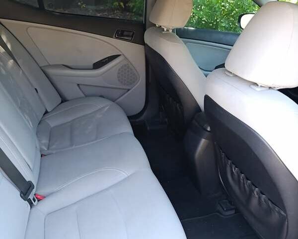 Серый Киа Оптима, объемом двигателя 2.36 л и пробегом 197 тыс. км за 10000 $, фото 26 на Automoto.ua