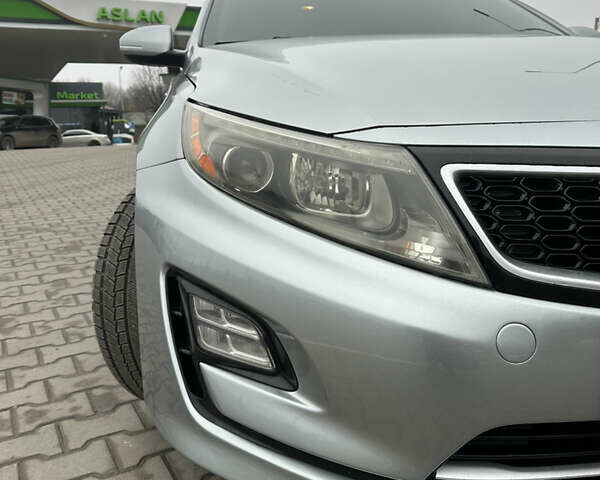 Сірий Кіа Оптіма, об'ємом двигуна 2.36 л та пробігом 174 тис. км за 12900 $, фото 5 на Automoto.ua