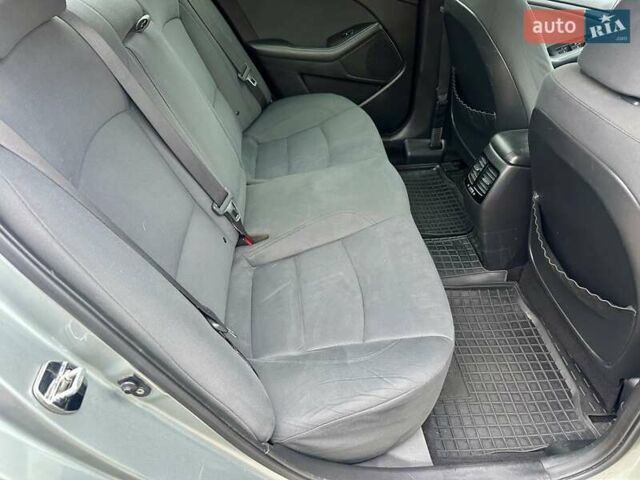 Серый Киа Оптима, объемом двигателя 2.36 л и пробегом 209 тыс. км за 9500 $, фото 21 на Automoto.ua