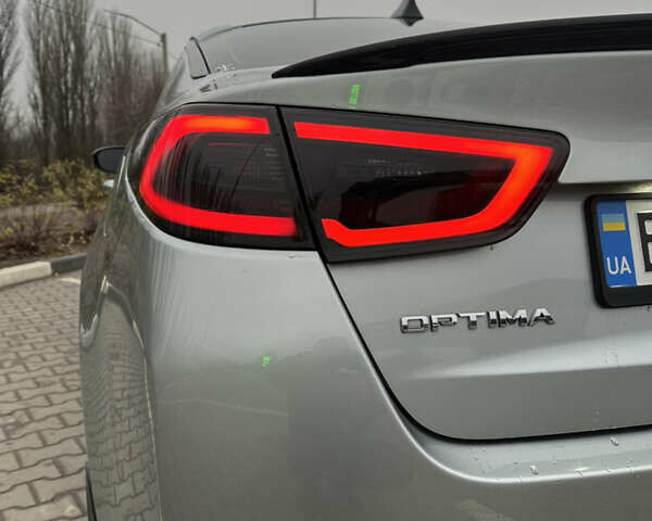 Сірий Кіа Оптіма, об'ємом двигуна 2.36 л та пробігом 174 тис. км за 12900 $, фото 6 на Automoto.ua