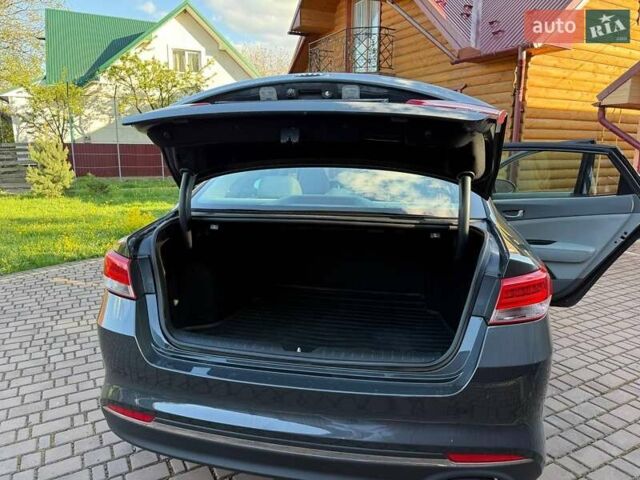 Сірий Кіа Оптіма, об'ємом двигуна 2.36 л та пробігом 118 тис. км за 11500 $, фото 24 на Automoto.ua