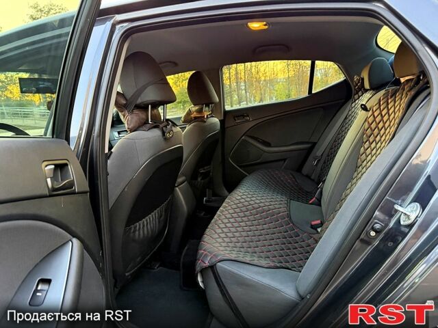 Серый Киа Оптима, объемом двигателя 2.4 л и пробегом 89 тыс. км за 11200 $, фото 5 на Automoto.ua