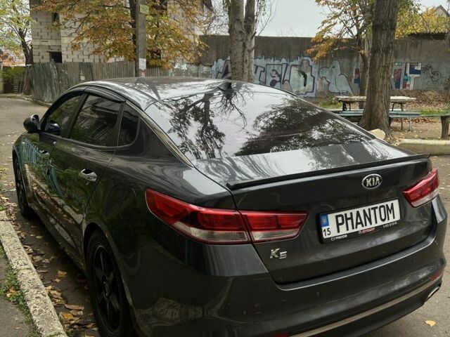 Серый Киа Оптима, объемом двигателя 2 л и пробегом 210 тыс. км за 12999 $, фото 3 на Automoto.ua