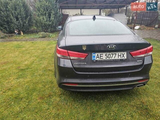 Серый Киа Оптима, объемом двигателя 1.69 л и пробегом 190 тыс. км за 12500 $, фото 4 на Automoto.ua