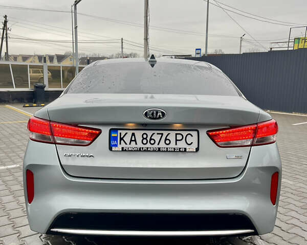 Сірий Кіа Оптіма, об'ємом двигуна 2 л та пробігом 168 тис. км за 11200 $, фото 1 на Automoto.ua