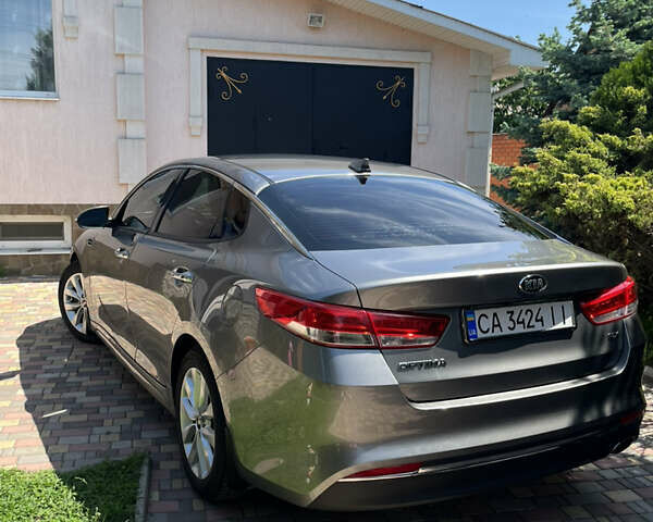Сірий Кіа Оптіма, об'ємом двигуна 2.36 л та пробігом 57 тис. км за 11900 $, фото 12 на Automoto.ua
