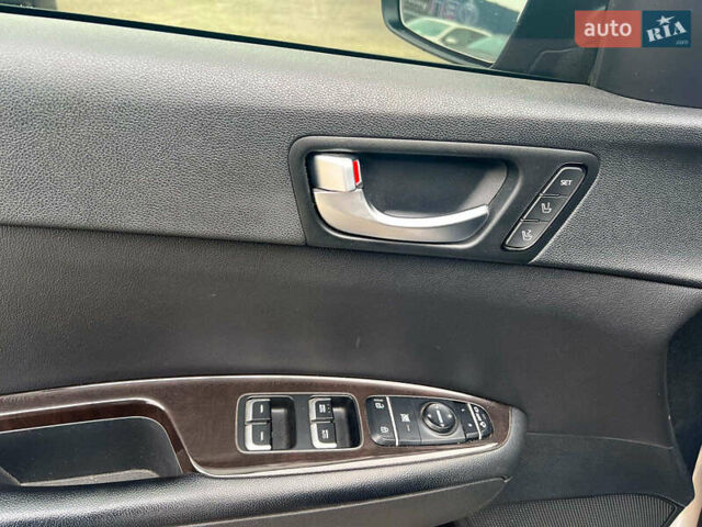 Серый Киа Оптима, объемом двигателя 2.4 л и пробегом 190 тыс. км за 12090 $, фото 13 на Automoto.ua