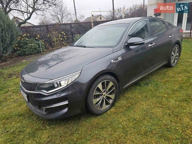 Серый Киа Оптима, объемом двигателя 1.69 л и пробегом 190 тыс. км за 12500 $, фото 2 на Automoto.ua