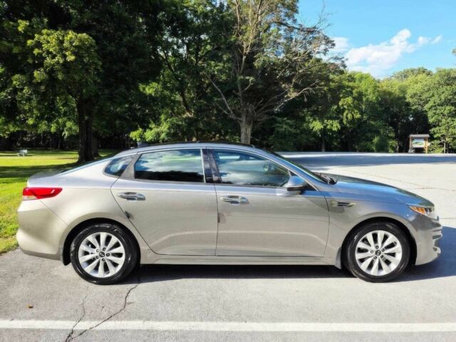 Серый Киа Оптима, объемом двигателя 2.4 л и пробегом 74 тыс. км за 9600 $, фото 2 на Automoto.ua