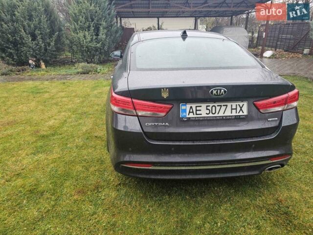 Сірий Кіа Оптіма, об'ємом двигуна 1.69 л та пробігом 190 тис. км за 12500 $, фото 4 на Automoto.ua