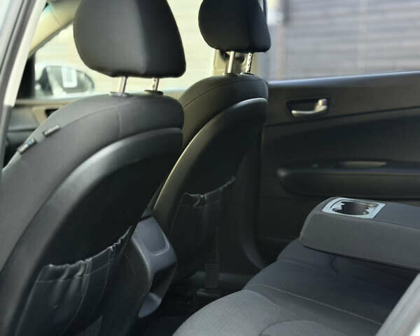 Сірий Кіа Оптіма, об'ємом двигуна 2.36 л та пробігом 192 тис. км за 9000 $, фото 4 на Automoto.ua