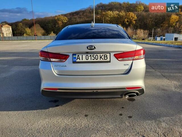 Сірий Кіа Оптіма, об'ємом двигуна 2.36 л та пробігом 165 тис. км за 14000 $, фото 5 на Automoto.ua