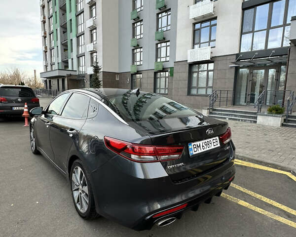 Сірий Кіа Оптіма, об'ємом двигуна 2 л та пробігом 142 тис. км за 10800 $, фото 3 на Automoto.ua