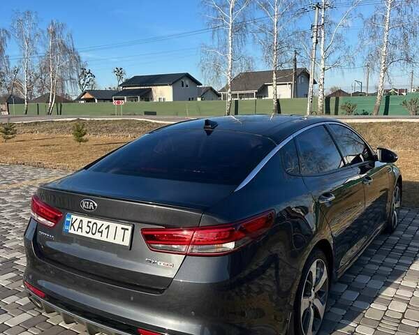 Серый Киа Оптима, объемом двигателя 2 л и пробегом 163 тыс. км за 12000 $, фото 4 на Automoto.ua