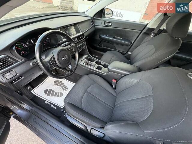 Серый Киа Оптима, объемом двигателя 2 л и пробегом 113 тыс. км за 12750 $, фото 9 на Automoto.ua